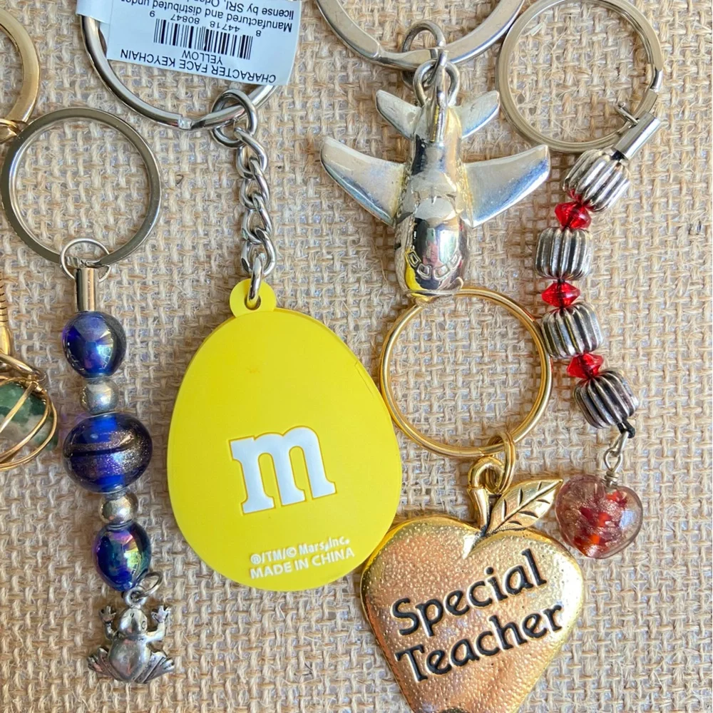 Lot of key chains rings with faux pearls bag airplane teacher in mixed tones